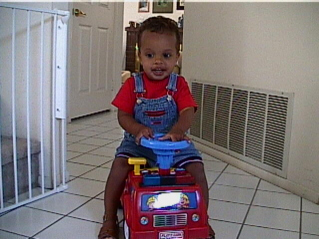 Riding his Fire Truck