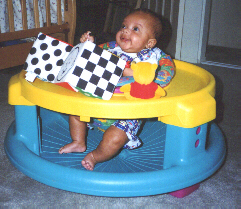 Playing in the Exersaucer