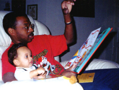 Daddy reads Josh a book